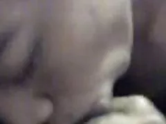 Chick with small tits fingering pussy in a wicker chair