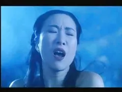 Brunette collects cum in a glass after jerking