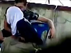Domina squeezes his thighs a man's head and makes facesitting