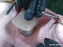 The left hand pulls the cum out of her pussy after hot sex