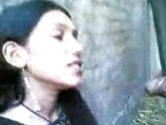Swarthy beauty with sexy eyes sucking a dick and banging